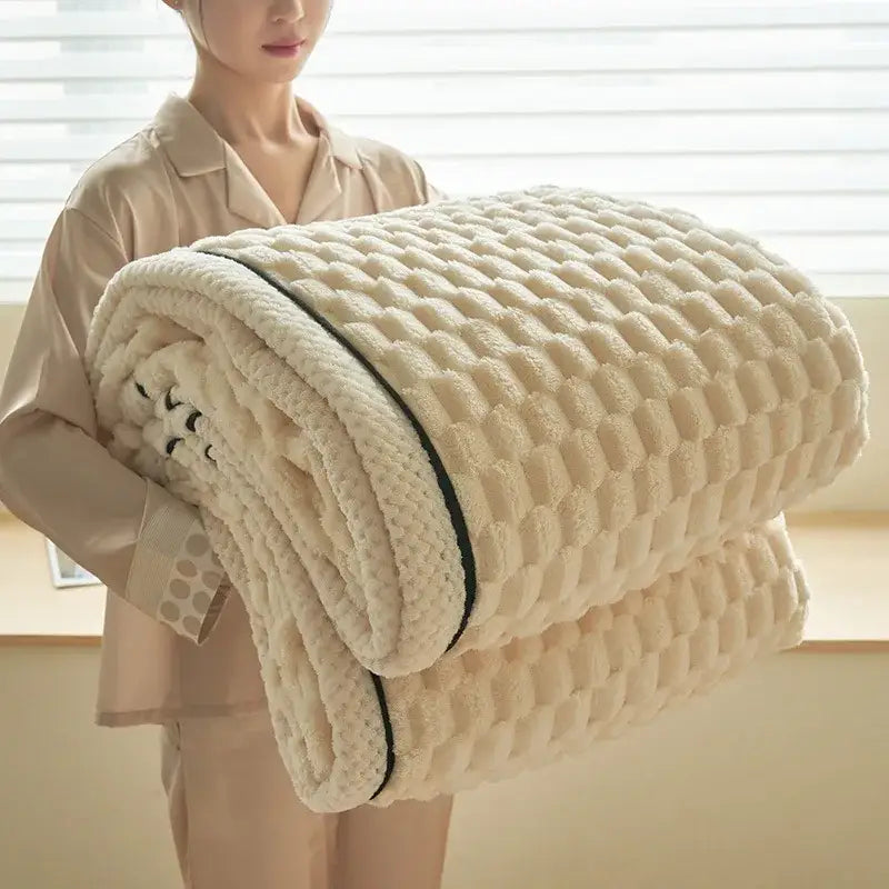 Cream coral fleece warm blanket with textured diamond pattern and black trim ideal for cozy bedroom decorbites use