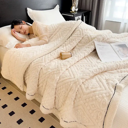 Cream coral fleece warm blanket with textured geometric pattern and black stitched trim by decorbites coral fleece