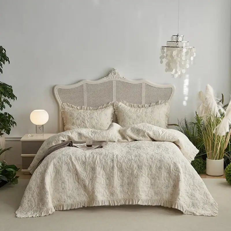 Cream-colored decorbites cotton quilted bedspread set with floral embroidery and soft fringed hem for bedroom decor