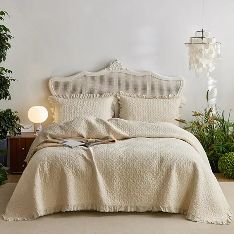 Cream-colored decorbites cotton quilted bedspread set with textured raised pattern and frayed edges for bedroom decor