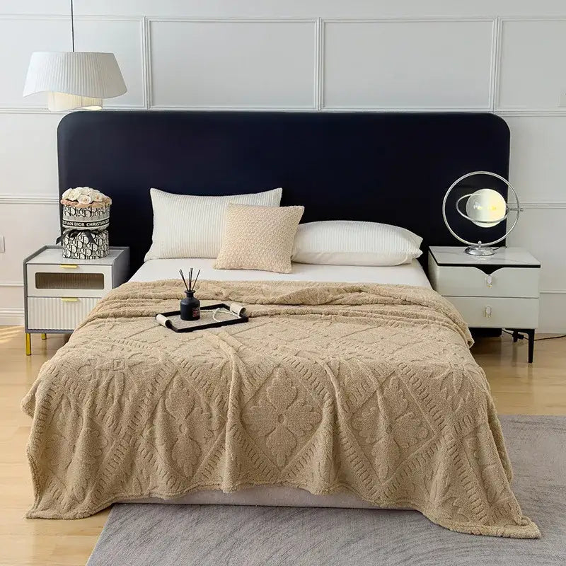 Beige textured knit throw blanket with diamond-patterned design used as a sofa cover blanket for living room