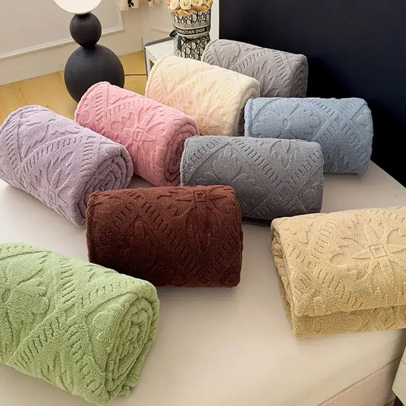 A plush cream jacquard sofa cover blanket with raised floral pattern in soft pastel and earthy tones for living room