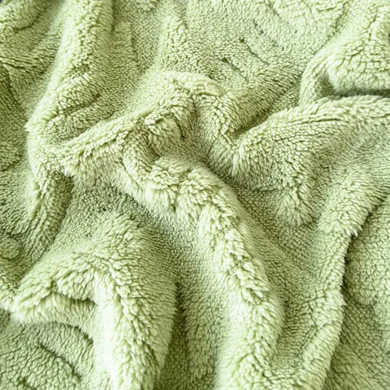 Soft light green textured cream jacquard sofa cover blanket with a fuzzy surface for living room use