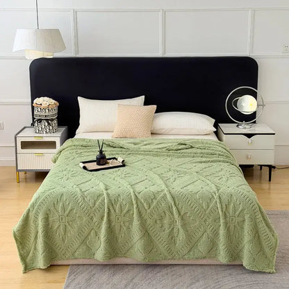 Soft mint green textured throw blanket with diamond-patterned knit design as a sofa cover blanket for living room