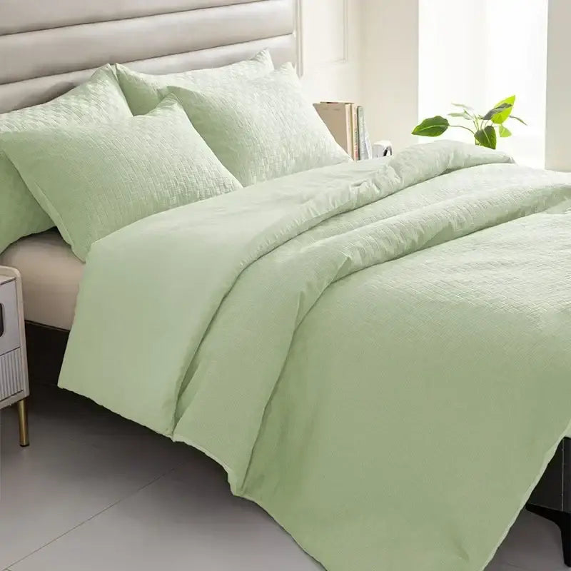 Light green textured duvet set with matching pillows as part of a pillowcase quilt set by decorbites comforter