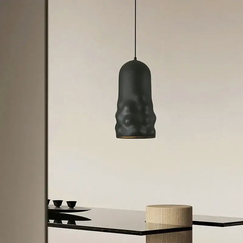 Black textured ceramic creamy wind pendant lamp with matte finish and organic sculpted shape for dining room decorbites pendant lamps