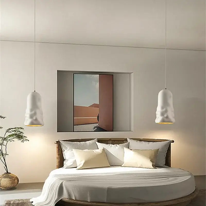Two white textured creamy wind pendant lamps hang symmetrically above bed enhancing dining room decorbites creamy wind decor