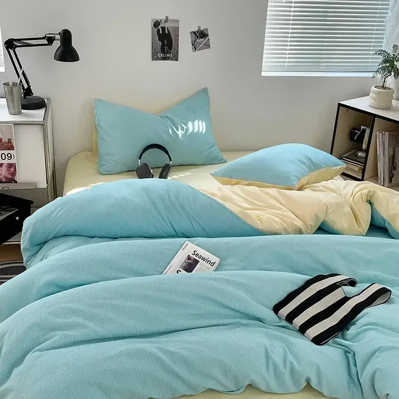 A cozy turquoise corduroy duvet set with a soft textured surface and matching pillowcases in luxury quilt sets
