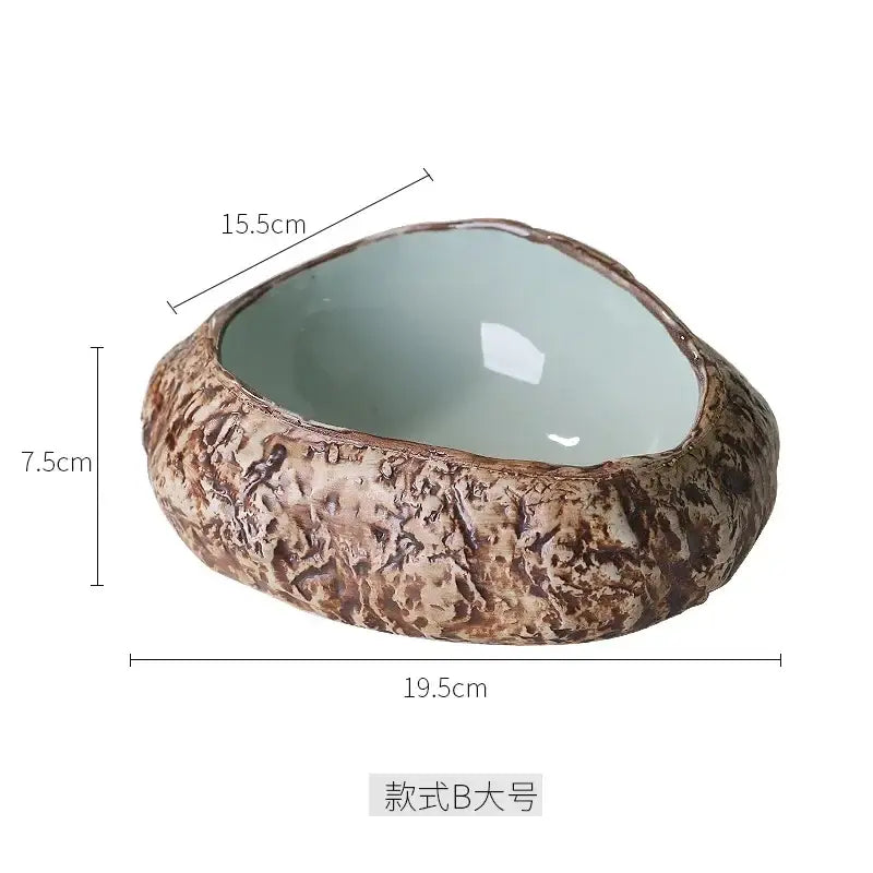 Rustic brown decorbites ceramic dessert bowl with smooth light blue interior and textured natural stone exterior