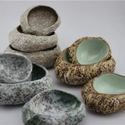 Handcrafted decorbites ceramic dessert plate with textured earthy speckled exterior and smooth pale green interior for dessert sashimi ice