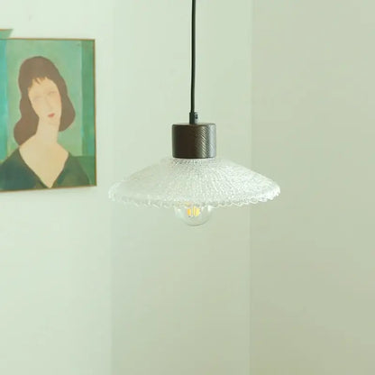 Clear glass led textured pendant light with dark metal fixture and black cord for kitchen decorbites clear glass lighting