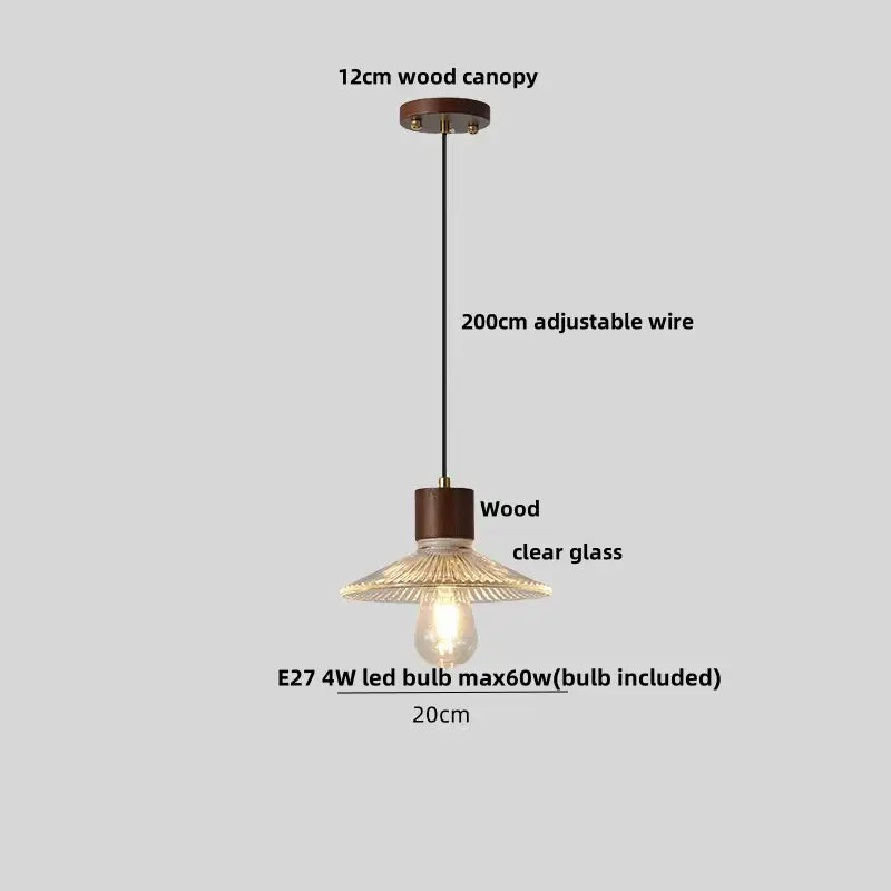 Rustic pendant light with dark wood canopy, adjustable black wire, and decorbites clear glass led shade with radial ribs