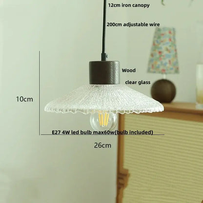 Clear glass led pendant light with textured scalloped shade and dark wood metal base for kitchen decorbites clear glass lighting