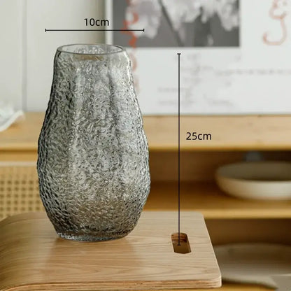 Textured frosted green transparent glass vase with hammered finish and organic shape for decorbites green transparent decor
