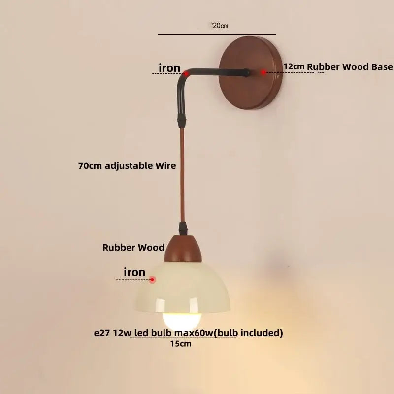 Warm-toned minimalist wall light fixture with curved iron arm and rubber wood shade for dining room use