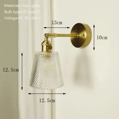 Vintage-style brass mirror wall sconce with textured clear glass shade ideal for bedroom decor by decorbites brass mirror