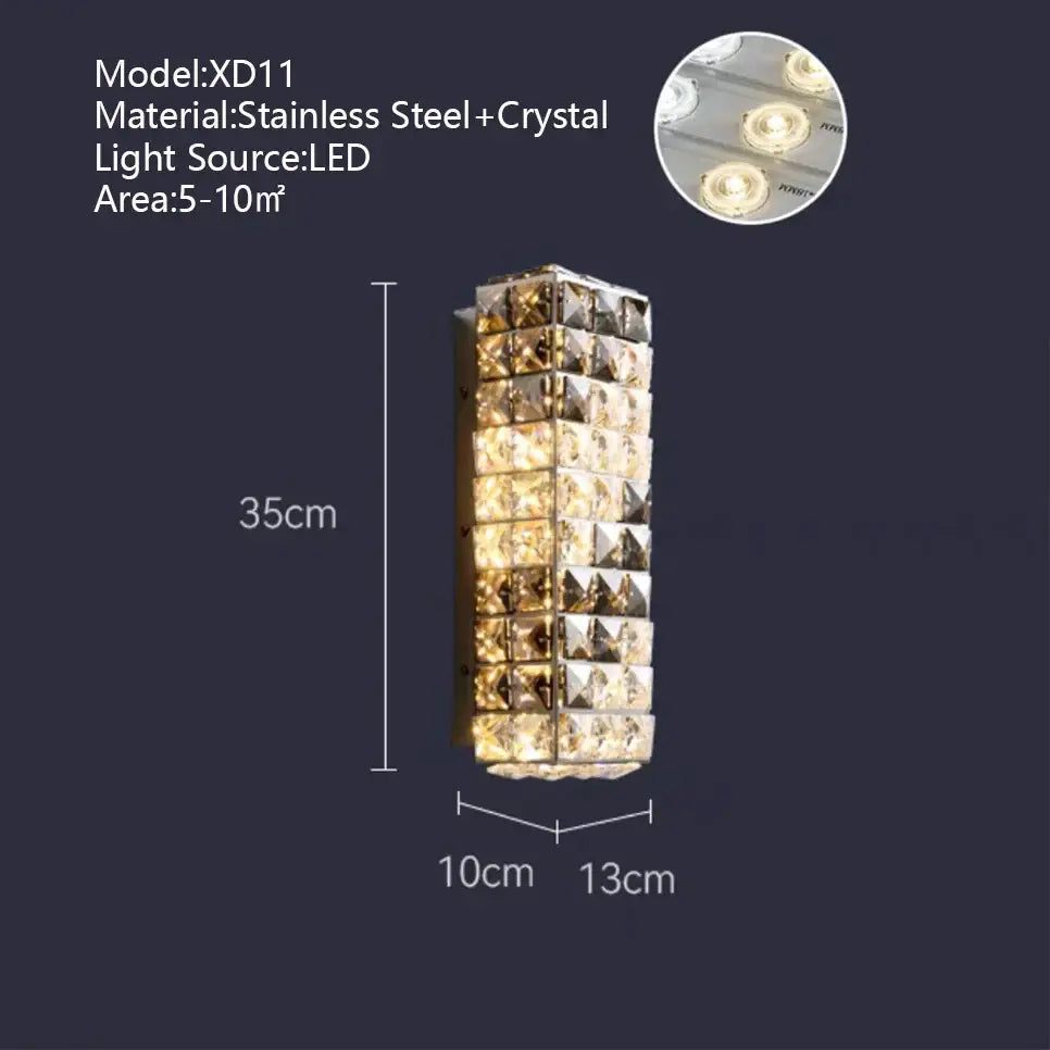 A sleek 35cm tall textured gold crystal led rectangle chandelier with faceted crystal squares in stainless steel