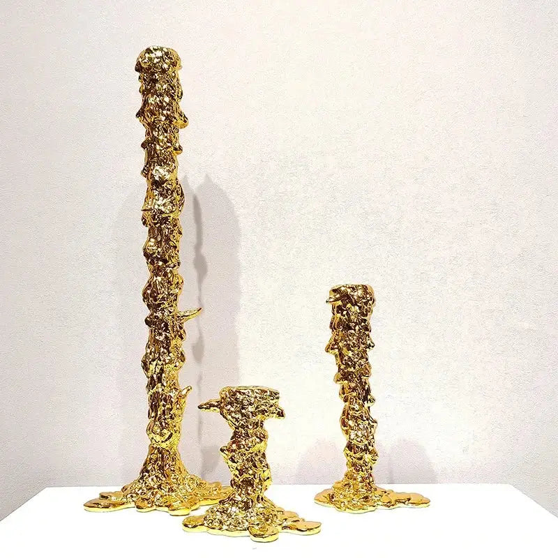 Three golden textured golden candlestick holders with molten metal finish for dining room decorbites centerpiece