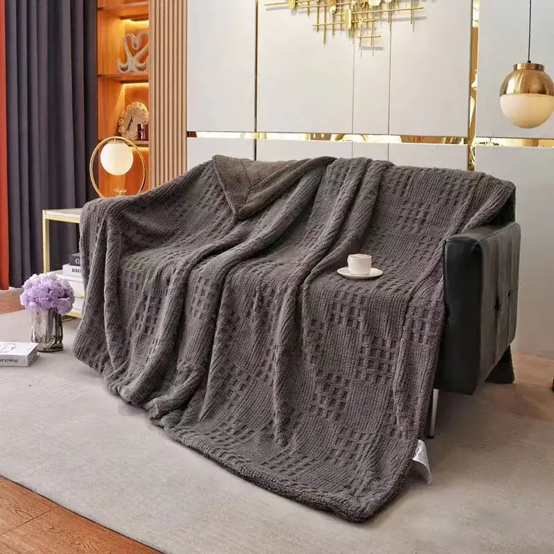 Textured gray coral fleece blanket with diamond-patterned knit throw and soft plush fleece blanket surface