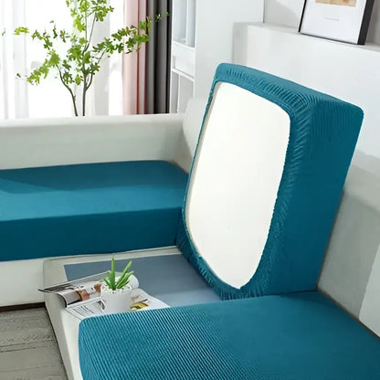 Teal stretch fabric sofa cover with white panel on backrest for textured green and beige elastic sofa cover protector