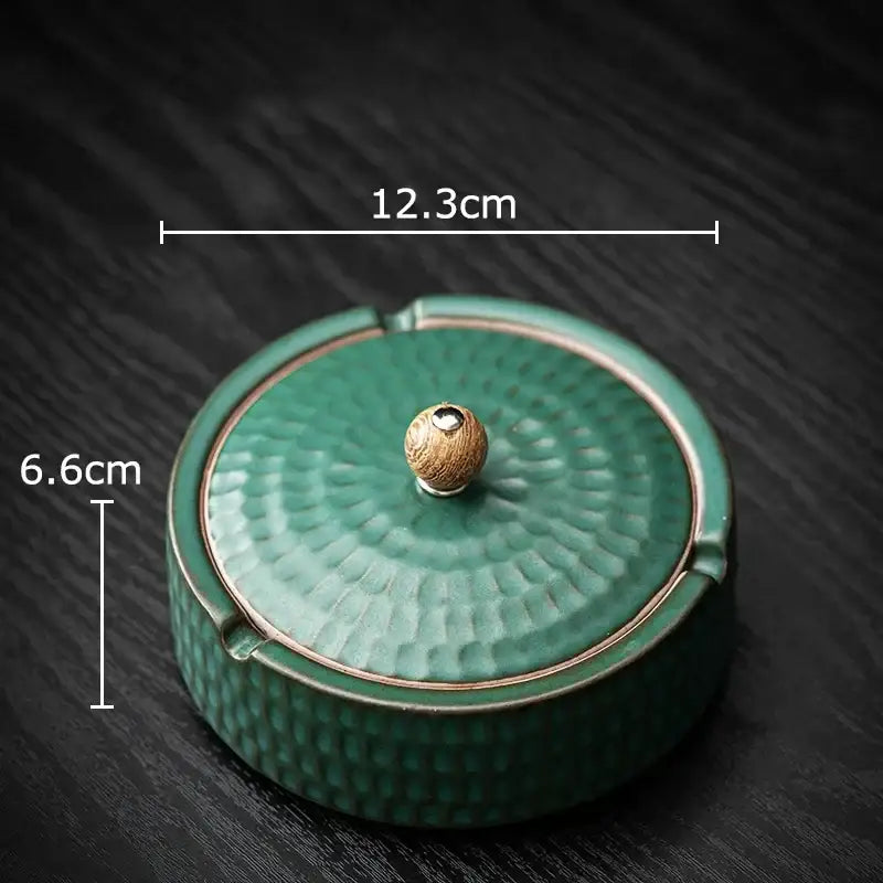 Textured green ceramic ashtray with hammered surface and wooden knob lid for living room smoking accessory