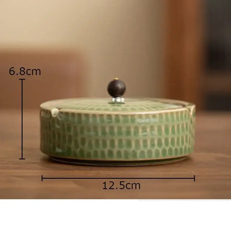 Textured green ceramic ashtray with dotted pattern and dark wooden knob lid by decorbites ceramic for office or living room decor