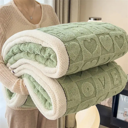 A cozy lamb wool blanket in green and cream fleece with a textured heart pattern for decorbites cozy lamb decor