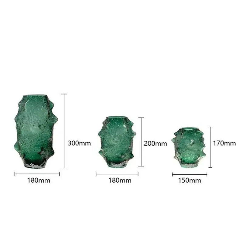 Three textured green sea cucumber glass vases with frosted finish and organic shapes for living room decor