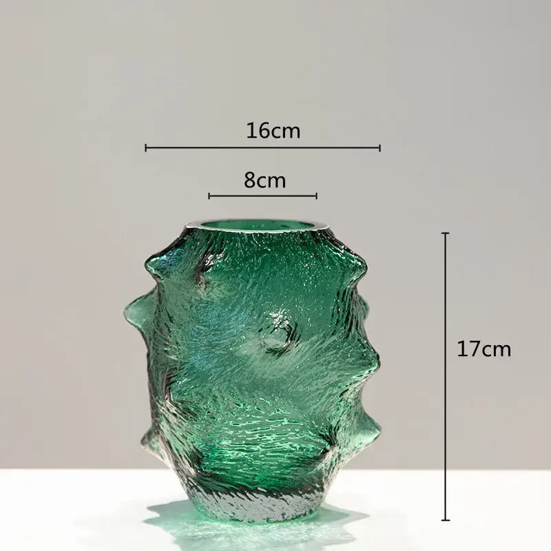Textured translucent emerald green sea cucumber glass vase with sculpted surface and flared rim for living room decor