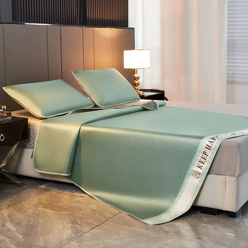 A mint green textured bed mat pillowcases set with 1800d cooling fibres and embroidered keep happy trim