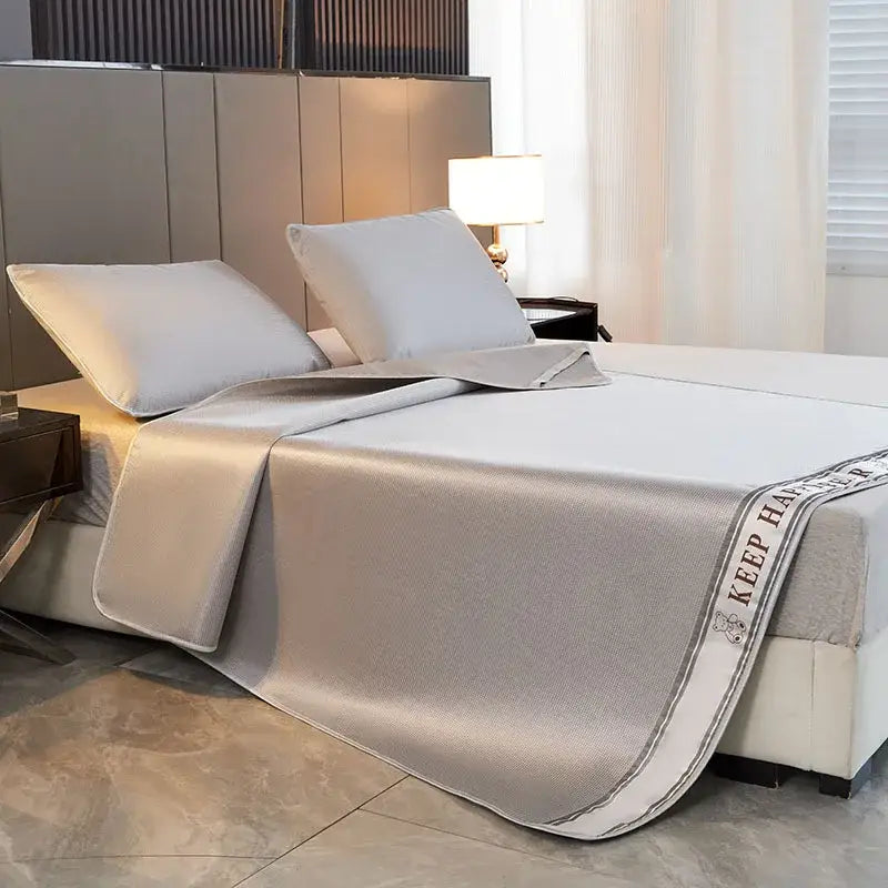 Silver-gray textured cooling bed mat with white border and keep h embroidery in 1800d cooling fibres pillowcases set