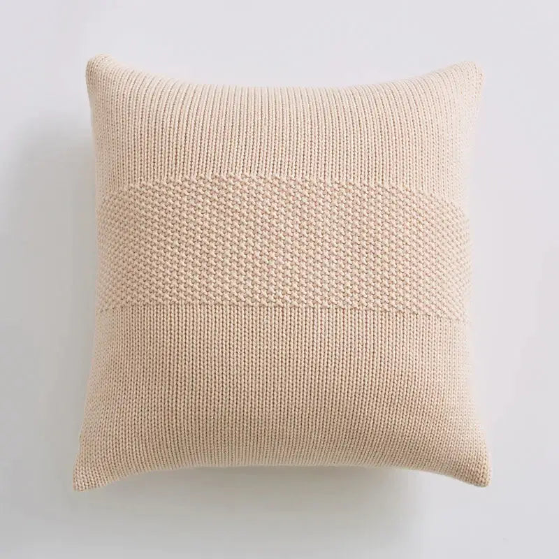 Beige knitted throw pillow with textured ribbed pattern and diamond-stitch band in decorbites knit cushion cover