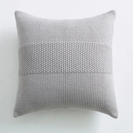 A soft light gray knit cushion cover with textured horizontal stitch patterns for living room decorbites decor