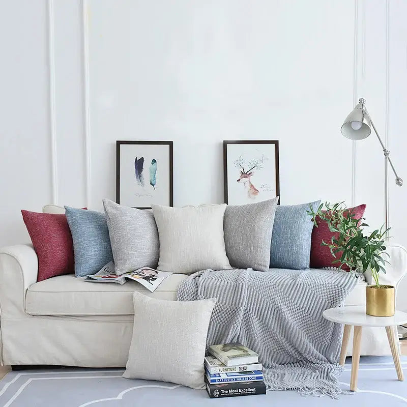 Beige linen sofa with decorbites linen cotton textured throw pillowcase in red blue and gray for living room decor