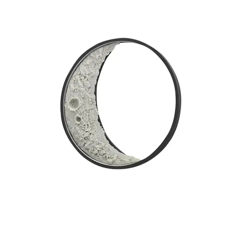 Textured moon crescent wall lamp with light gray lunar terrain surface and sleek black border for warm garden terrace lighting