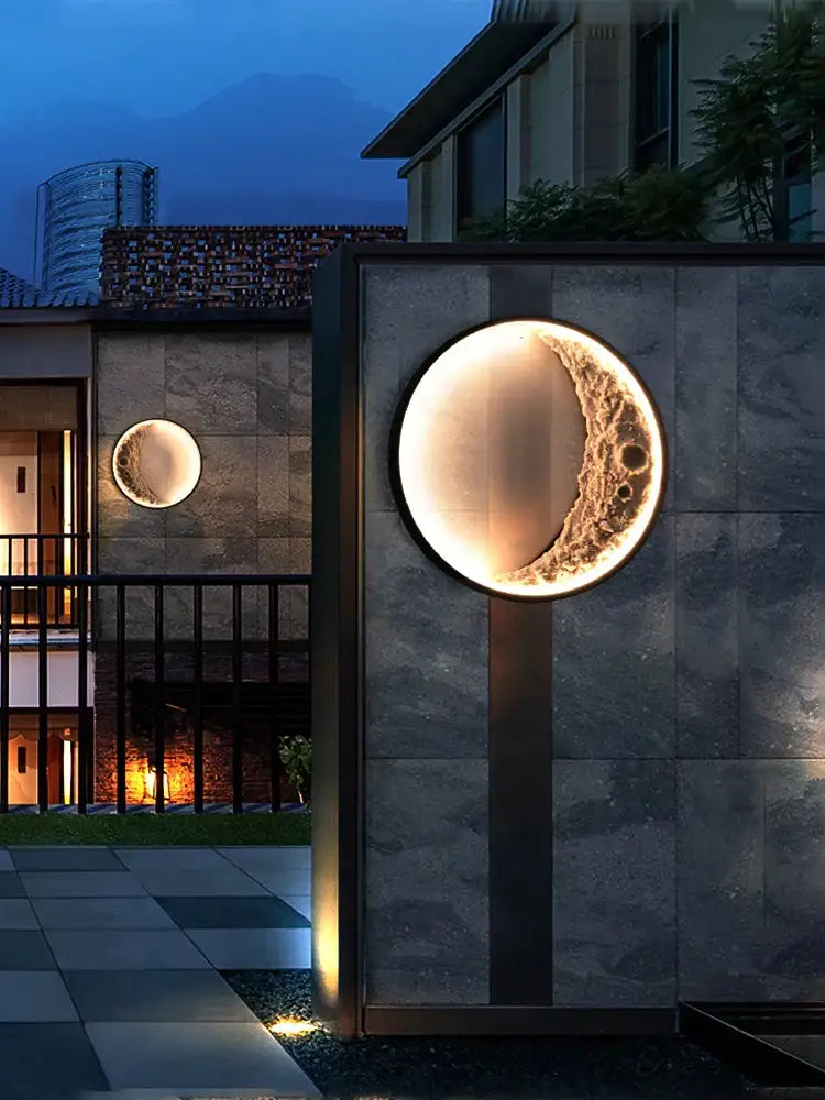 Textured crescent wall lamp with circular illuminated moon design and warm glowing light for garden terrace decorbites wall lamp
