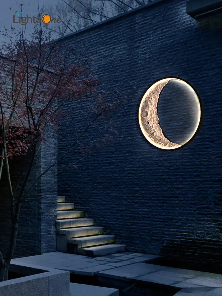 Textured crescent wall lamp with illuminated moon shape and warm glow for garden terrace decorbites wall lamp