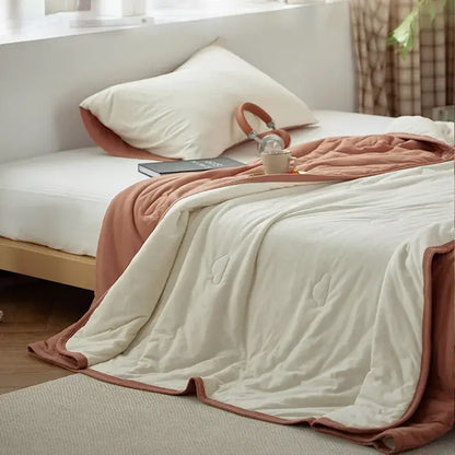 A cozy two-toned cotton summer comforter with cream exterior and terracotta lining by decorbites cotton summer