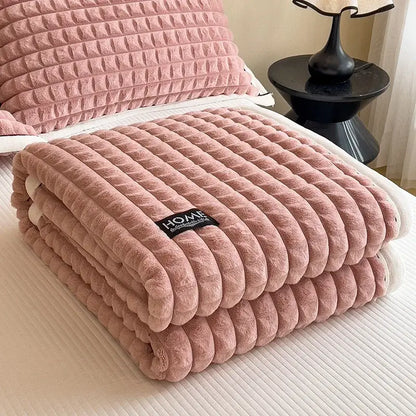 A dusty rose textured pink and cream cozy flannel velvet blanket with ribbed stitching for bedroom decorbites cozy flannel use