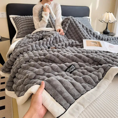 Gray plush throw blanket with textured wavy knit and cream fleece lining from decorbites cozy flannel velvet collection