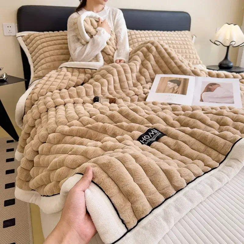 Beige plush quilted blanket with soft textured surface and white fleece lining from decorbites cozy flannel velvet collection