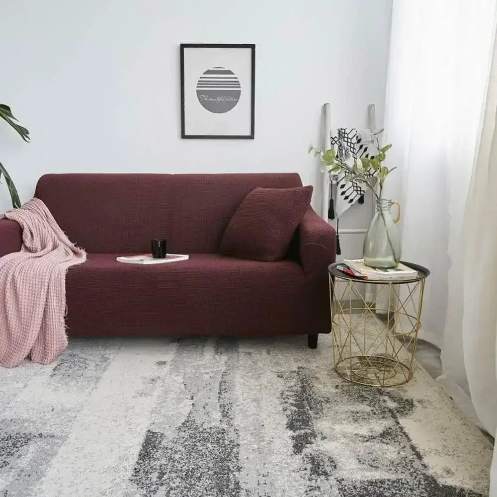 Textured purple cozy fleece sofa slipcover with matching cushion and pink knitted throw blanket for living room decorbites cozy fleece sofa