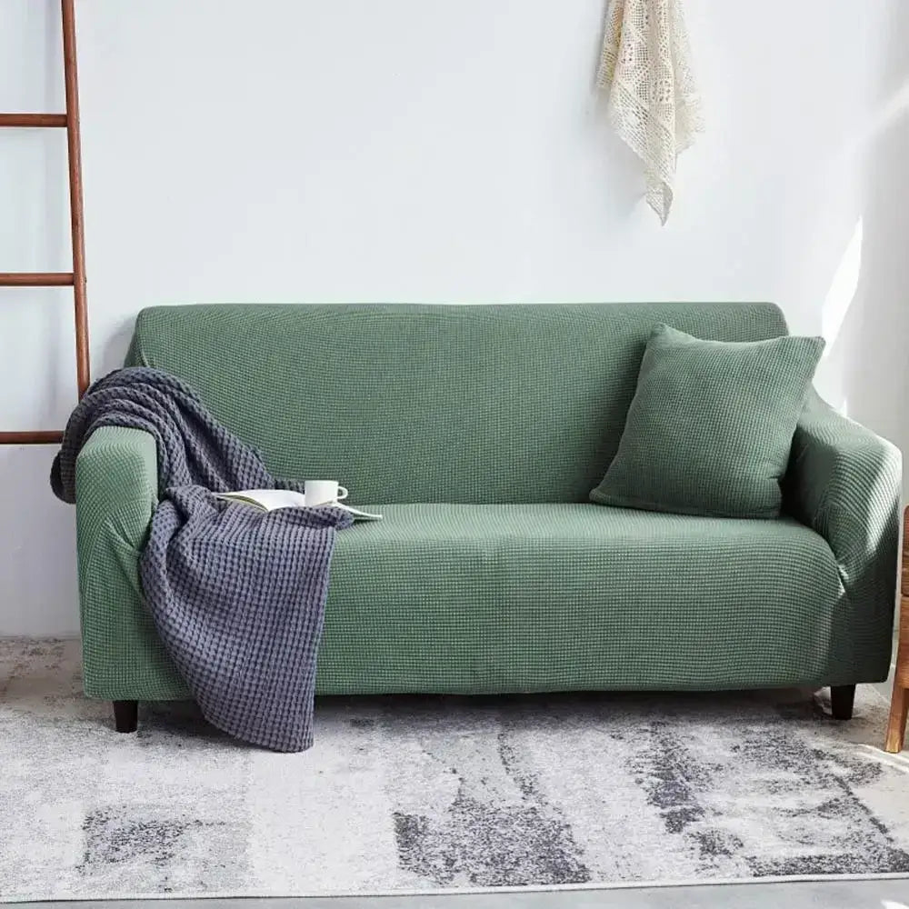 Green textured fabric sofa slipcover made of decorbites cozy fleece for living room furniture protection