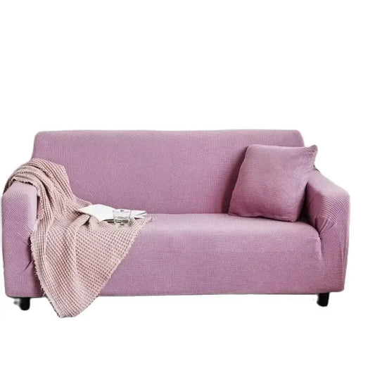 Textured purple cozy fleece sofa slipcover with matching pillow and beige knitted throw for living room decorbites cozy fleece
