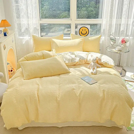 Soft yellow linen bedding set with matching pillows featuring decorbites cotton three-layer textured finish