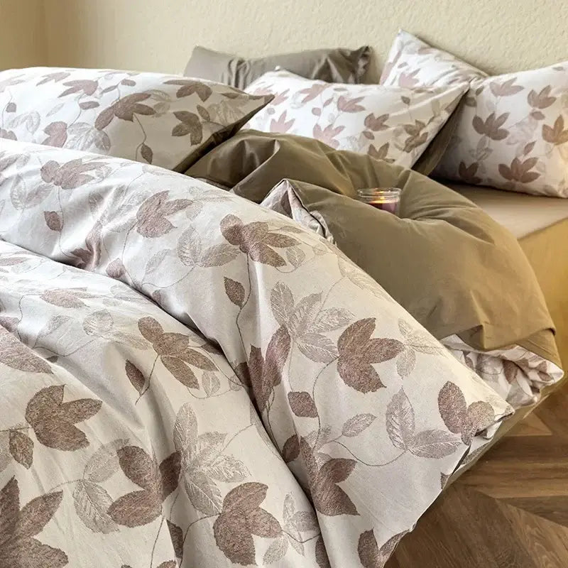 Beige and brown leaf-patterned decorbites cotton three-layer bedding set with soft yellow textured duvet and pillowcases