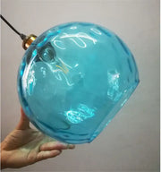 Textured turquoise blue glass ball pendant light with bubble surface and brass fixture for kitchen decorbites blue glass pendant lights