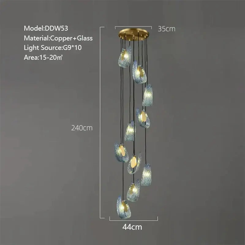 A modern copper and glass chandelier with ten teardrop-shaped shades complements decorbites blue glass luxury wall sconce decor