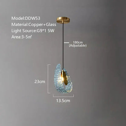 Modern teardrop-shaped wall sconce with textured turquoise blue glass luxury shade and copper accents by decorbites