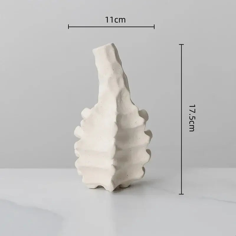 Textured white geometric decorbites ceramic vase with leaf-like silhouette and ridges for home decor